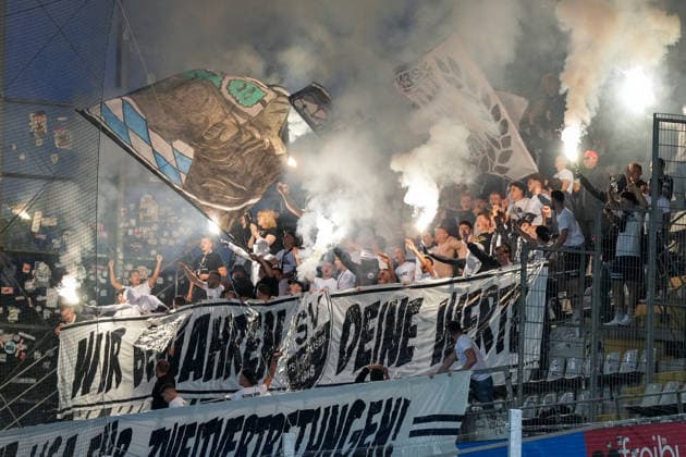 Pyrotechnics, flares, fire, smoke, pyro, ultras, fans, banners held by fans and ultras in the stands, Germany, soccer, Regionalliga Südwest, Matchday 7, 2026–2027, SC Freiburg II vs. SV Sandhausen, September 11, 2026, Dreisamstadion, Freiburg, Dreisamstadion, Baden-Württemberg, Germany Copyright: xArnexAmbergx