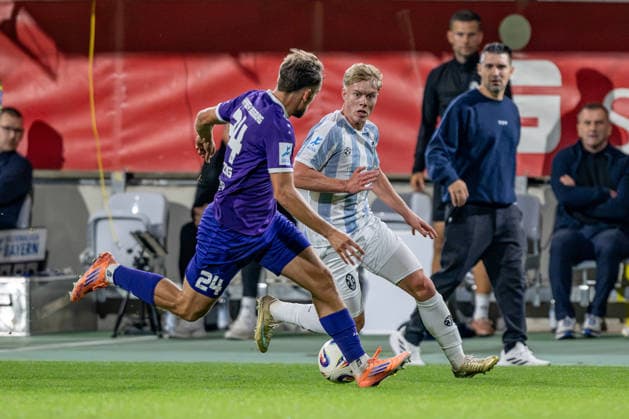 Battle for the ball: A tackle between Elias Herzig (TSV 1847 Schwaben Augsburg, 24) and Fabio Wagner (TSV 1860 Munich, 09 GER), TSV 1860 Munich vs. TSV Schwaben Augsburg, Soccer, Bavarian Regional League, Matchday 8, 2026–2027 season, September 11, 2026 DFL and DFB regulations prohibit any use of photographs as image sequences and or quasi-video. Photo: HMB Media, Heike Feiner Copyright: HMBxMedia HeikexFeiner