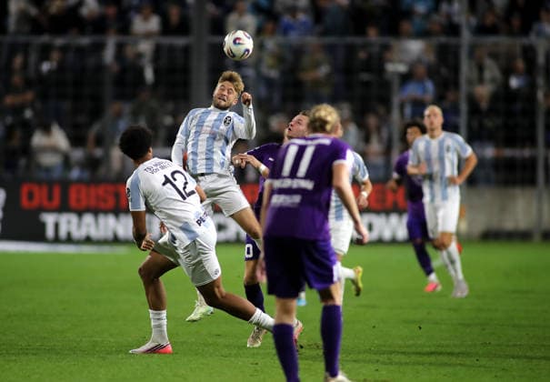 Soccer, Men s, Bavarian Regional League, 2026–2027 Season, TSV 1860 Munich vs. Schwaben Augsburg, Grünwalder Stadium: Matthew Collins of TSV 1860 Munich jumps up for a header