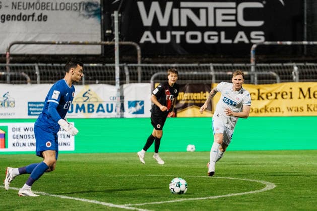 Germany, Soccer, Men s 3rd Division 2026–2027, Matchday 5: FC Viktoria Köln vs. FC Hansa Rostock; Cologne; Arne Schulz (FC Viktoria Köln); 1 more long ball toward Andreas Voglsammer (Hansa Rostock); 9, pressing, closing down Copyright: xThiemoxRudolphx