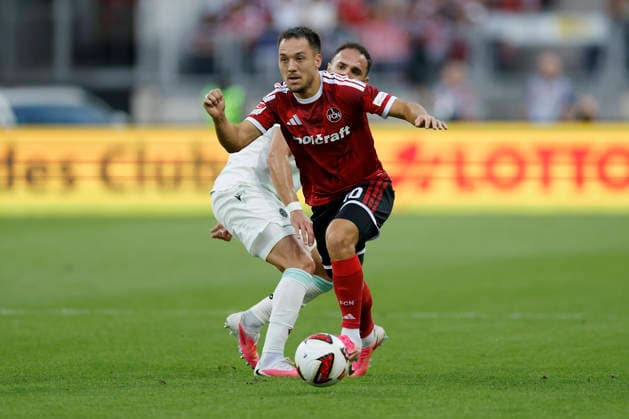 v.l.n.r.: Virgil GhiÈ›Äƒ (Hannover 96) und Julian Justvan (1. FC Nürnberg), im 2. Bundesliga-Spiel zwischen dem 1. FC Nürnberg und Hannover 96 im Max-Morlock-Stadion, Nürnberg, Deutschland, am 11. September 2026. DFB DFL REGULATIONS PROHIBIT ANY USE OF PHOTOGRAPHS AS IMAGE SEQUENCES AND OR QUASI-VIDEO, *** From left to right: Virgil GhiÈ›Äƒ of Hannover 96 and Julian Justvan of 1 FC Nürnberg, in the 2. Bundesliga match between 1 FC Nürnberg and Hannover 96 at Max Morlock Stadium, Nuremberg, Germany, on September 11, 2026. DFB and DFL regulations prohibit any use of photographs as image sequences and or quasi-video, Copyright: HMBxMedia xHeikoxBecker