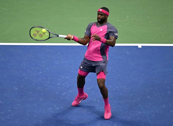 Frances Tiafoe returns a ball to Ben Shelton in the first set in the Men s Semifinal Arthur Ashe Stadium at the 2026 US Open Tennis Championship at the USTA Billie Jean King National Tennis Center in New York City on Friday, September 11, 2026.  NYP20260911209 LARRYxMARANO