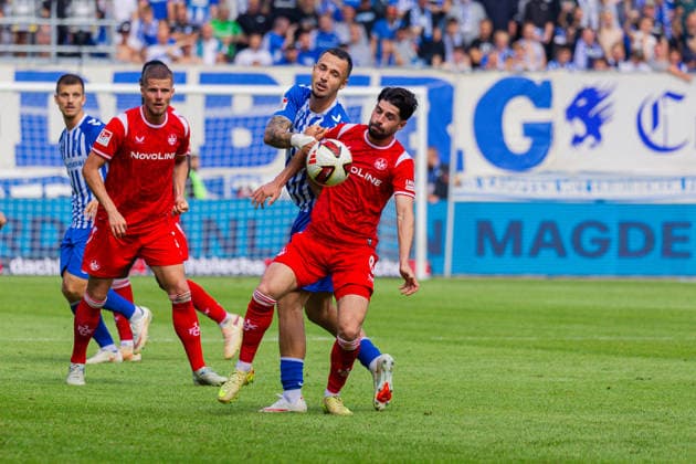 Deutschland: 2.Bundesliga, Saison 2026 2027, 12.09.2026, 5. Spieltag,1.FC Magdeburg vs 1. FC Kaiserslautern, Avnet Arena : Falko Michel (1.FC Magdeburg, 21) im Zweikampf gegen Semih Sahin (1. FC Kaiserslautern, 8) *** Germany 2. Bundesliga, 2026–2027 Season, September 12, 2026, Matchday 5, 1. FC Magdeburg vs. 1. FC Kaiserslautern, Avnet Arena: Falko Michel (1. FC Magdeburg) challenges Semih Sahin (1. FC Kaiserslautern) for the ball, 8 Copyright: xMichellexLukax