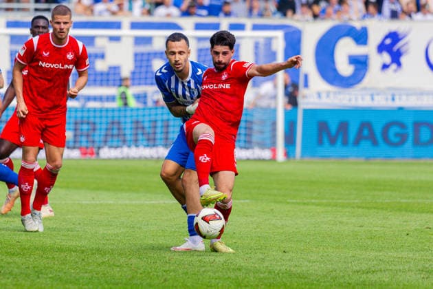 Deutschland: 2.Bundesliga, Saison 2026 2027, 12.09.2026, 5. Spieltag,1.FC Magdeburg vs 1. FC Kaiserslautern, Avnet Arena : Falko Michel (1.FC Magdeburg, 21) im Zweikampf gegen Semih Sahin (1. FC Kaiserslautern, 8) *** Germany 2. Bundesliga, 2026–2027 Season, September 12, 2026, Matchday 5, 1. FC Magdeburg vs. 1. FC Kaiserslautern, Avnet Arena: Falko Michel (1. FC Magdeburg) challenges Semih Sahin (1. FC Kaiserslautern) for the ball, 8 Copyright: xMichellexLukax