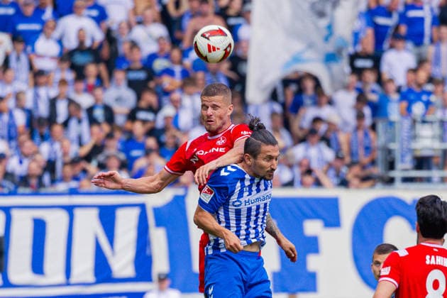 Deutschland: 2.Bundesliga, Saison 2026 2027, 12.09.2026, 5. Spieltag,1.FC Magdeburg vs 1. FC Kaiserslautern, Avnet Arena : Jan Elvedi (1. FC Kaiserslautern, 33) im Kopfball Duell gegen Baris Atik (1.FC Magdeburg, 23) *** Germany 2. Bundesliga, 2026–2027 Season, September 12, 2026, Matchday 5, 1 FC Magdeburg vs. 1 FC Kaiserslautern, Avnet Arena: Jan Elvedi (1 FC Kaiserslautern, No. 33) in a header duel against Baris Atik (1 FC Magdeburg, No. 23) Copyright: xMichellexLukax