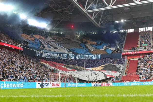 September 12, 2026, GER, Soccer, Men s, 3rd Division, 2026–2027 Season, Fortuna Düsseldorf vs. MSV Duisburg; MSV fans with a choreographed display and setting off pyrotechnics; Düsseldorf Merkur Spiel Arena, North Rhine-Westphalia, Germany Copyright: xAdrianxSchlüterx