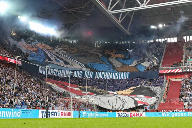 September 12, 2026, GER, Soccer, Men s, 3rd Division, 2026–2027 Season, Fortuna Düsseldorf vs. MSV Duisburg; MSV fans with a choreographed display and setting off pyrotechnics; Düsseldorf Merkur Spiel Arena, North Rhine-Westphalia, Germany Copyright: xAdrianxSchlüterx