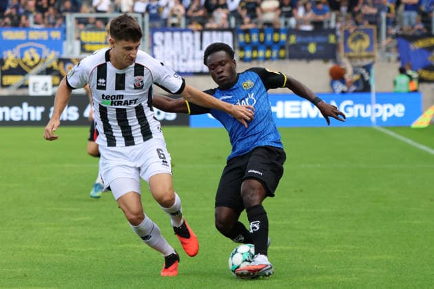 September 12, 2026, Soccer, Men s, 3rd Division, 2026–2027 Season, 1 FC Saarbrücken vs. FC Ingolstadt 04, Kelsey Owusu (1 FC Saarbrücken), Georgios Antzoulas (FC Ingolstadt 04), Saarbrücken, Ludwigsparkstadion, Saarland, Germany, DEU Copyright: xSebastianxBachx