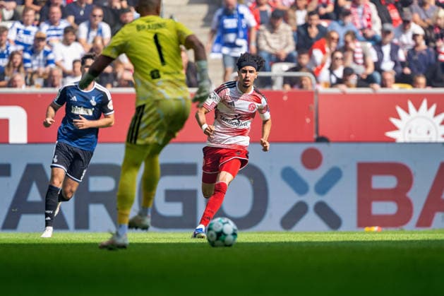 Max Braune (MSV Duisburg, No. 01) is tackled by Anas Slimani (Fortuna Düsseldorf, No. 34). Fortuna Düsseldorf vs. MSV Duisburg, Soccer, 3rd League, Matchday 5, 2026–27 Season, September 12, 2026, DFL regulations prohibit any use of photographs as image sequences and or quasi-video. Fortuna Düsseldorf vs. MSV Duisburg, soccer, 3rd Division, Matchday 5, 2026–27 season, September 12, 2026, Düsseldorf Copyright: xEibner-Pressefoto LukasxBaldygax EP_LBA