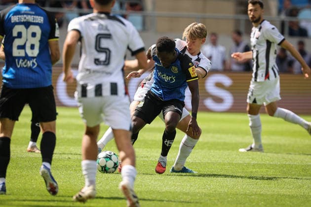 3rd Division, 2026–27 Season, Match 1: FC Saarbrücken vs. FC Ingolstadt 04, Max Plath (No. 14), FCI Kelsey Owusu (No. 31), Saarbrücken, Photo by Jürgen Meyer, 3rd Division, 2026–27 Season, Match 1: FC Saarbrücken vs. FC Ingolstadt 04