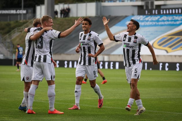 3rd Division, 2026–27 Season: 1. FC Saarbrücken vs. FC Ingolstadt 04 XXXXX XXXXX Photo by Meyer: Lars Lokotsch (No. 13, FCI) scores the opening goal (0–1); FCI celebrates. 3rd Division, 2026–27 Season: 1. FC Saarbrücken vs. FC Ingolstadt 04