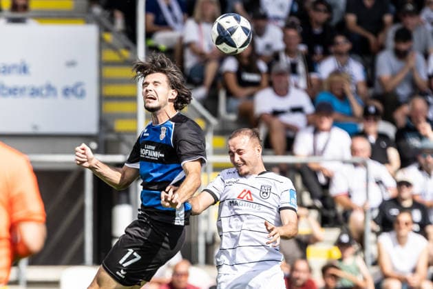 SSV Ulm 1846 Soccer vs. FSV Frankfurt, Soccer, Regionalliga Southwest, Matchday 7, Donaustadion Ulm, Ulm, September 12, 2026, l Filip Pandza, FSV Frankfurt, 17, Mattis Hoppe, SSV Ulm 1846 Soccer, 02 SSV Ulm 1846 Soccer vs. FSV Frankfurt, Soccer, Regionalliga Southwest, Matchday 7, Donaustadion Ulm, Ulm, September 12, 2026; Photo by Lucca Fundel, Ulm, Donaustadion Ulm, Baden-Württemberg, Germany