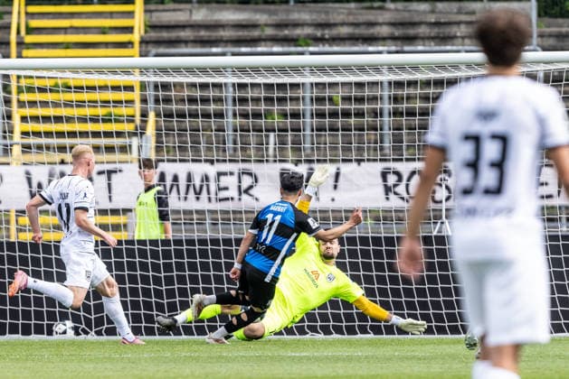SSV Ulm 1846 Soccer vs. FSV Frankfurt, Soccer, Regionalliga Southwest, Matchday 7, Donaustadion Ulm, Ulm, September 12, 2026, Radomir Novakovic, SSV Ulm 1846 Soccer, 01 saves a shot by Ismail Harnafi of FSV Frankfurt, 11 SSV Ulm 1846 Soccer vs. FSV Frankfurt, Soccer, Regionalliga Southwest, Matchday 7, Donaustadion, Ulm, September 12, 2026 Photo by Lucca Fundel Ulm Donaustadion, Ulm, Baden-Württemberg, Germany