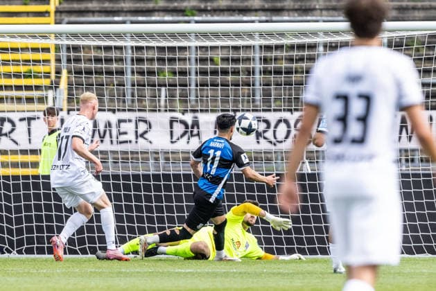 SSV Ulm 1846 Soccer vs. FSV Frankfurt, Soccer, Regionalliga Southwest, Matchday 7, Donaustadion Ulm, Ulm, September 12, 2026, Radomir Novakovic, SSV Ulm 1846 Soccer, 01 saves a shot by Ismail Harnafi of FSV Frankfurt, 11 SSV Ulm 1846 Soccer vs. FSV Frankfurt, Soccer, Regionalliga Southwest, Matchday 7, Donaustadion, Ulm, September 12, 2026 Photo by Lucca Fundel Ulm Donaustadion, Ulm, Baden-Württemberg, Germany