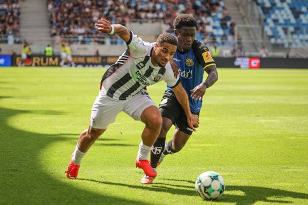 3rd Division, 2026–27 Season, Match 1: FC Saarbrücken vs. FC Ingolstadt 04; Keanan Bennetts (No. 18, FCI) and Kelsey Owusu (No. 31, Saarbrücken); Photo by Jürgen Meyer; 3rd Division, 2026–27 Season, Match 1: FC Saarbrücken vs. FC Ingolstadt 04