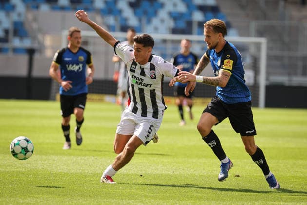 3rd Division, 2026–27 Season: 1. FC Saarbrücken vs. FC Ingolstadt 04. Emre Gül (No. 5, FCI) and Niko Bretschneider (No. 28, Saarbrücken). Photo by Jürgen Meyer. 3rd Division, 2026–27 Season: 1. FC Saarbrücken vs. FC Ingolstadt 04