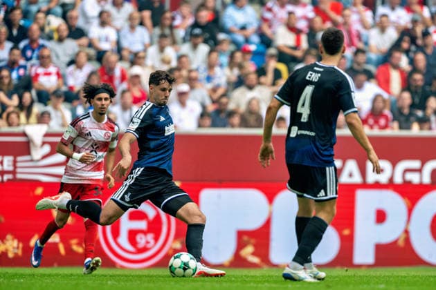 Tobias Fleckstein (MSV Duisburg), No. 05, clears the ball past Anas Slimani (Fortuna Düsseldorf), No. 34; Fortuna Düsseldorf vs. MSV Duisburg, Soccer, 3rd Division, Matchday 05, 2026–27 Season, September 12, 2026, DFL regulations prohibit any use of photographs as image sequences and or quasi-video, Fortuna Düsseldorf vs. MSV Duisburg, Soccer, 3. Liga, Matchday 5, 2026–27 season, September 12, 2026, Düsseldorf Copyright: xEibner-Pressefoto LukasxBaldygax EP_LBA