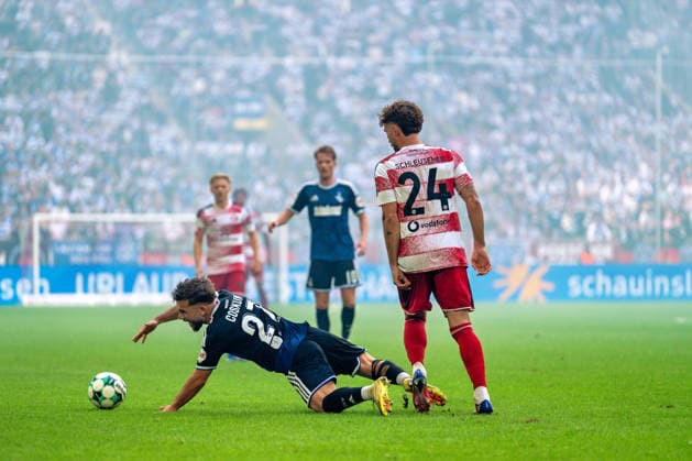 Can Coskun (MSV Duisburg), 27, in a tackle with Fabian Schleusener (Fortuna Düsseldorf), 24; Fortuna Düsseldorf vs. MSV Duisburg, Soccer, 3rd Division, Matchday 5, 2026–27 Season, September 12, 2026, DFL regulations prohibit any use of photographs as image sequences and or quasi-video; Fortuna Düsseldorf vs. MSV Duisburg, soccer, 3. Liga, Matchday 5, 2026–27 season, September 12, 2026, Düsseldorf Copyright: xEibner-Pressefoto LukasxBaldygax EP_LBA