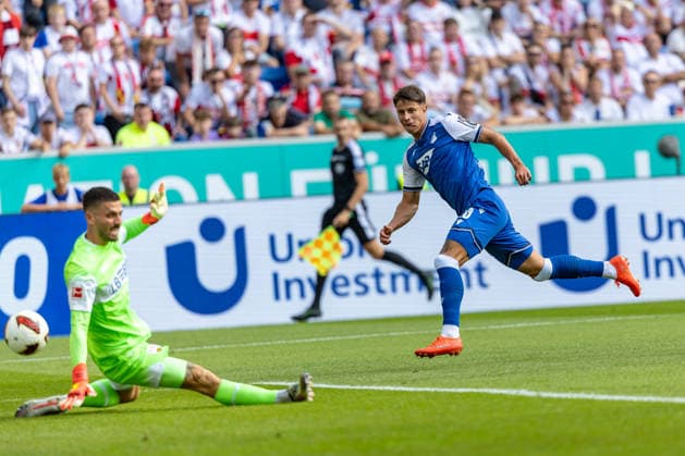 Tor 1:0 Adam Hlozek (TSG Hoffenheim, 10) laesst Fabian Bredlow (VfB Stuttgart, 01) keine Chance Zunge aus Mund, GER, TSG Hoffenheim vs. VfB Stuttgart, Fussball, 1. Bundesliga, 03. Spieltag, Spielzeit 2026 2027, 12.09.2026, DFL DFB REGULATIONS PROHIBIT ANY USE OF PHOTOGRAPHS AS IMAGE SEQUENCES AND OR QUASI-VIDEO, GER, TSG Hoffenheim vs. VfB Stuttgart, Fussball, 1. Bundesliga, 03. Spieltag, Spielzeit 2026 2027, 12.09.2026 Sinsheim *** Goal 1 0 Adam Hlozek (TSG Hoffenheim), 10 Fabian Bredlow (VfB Stuttgart), 01 no chance—tongue out of mouth, GER, TSG Hoffenheim vs. VfB Stuttgart, Soccer, Bundesliga 1, Matchday 03, 2026–2027 season, September 12, 2026, DFL and DFB regulations prohibit any use of photographs as image sequences and or quasi-video, GER, TSG Hoffenheim vs. VfB Stuttgart, soccer, Bundesliga 1, Matchday 3, 2026–2027 season, September 12, 2026, Sinsheim Copyright: xEibner-Pressefoto JanixPlessx EP_JPL