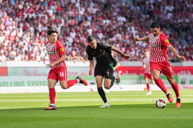 1. Bundesliga: SC Freiburg vs Borussia Mönchengladbach, 12.09.2026 Zweikampf zwischen Kevin Diks (Borussia Mönchengladbach, 4) und Igor MatanoviÄ‡ (SC Freiburg, 31) 1. Bundesliga: SC Freiburg vs Borussia Mönchengladbach, Europa-Park-Stadion, 12.09.2026 DFB DFL REGULATIONS PROHIBIT ANY USE OF PHOTOGRAPHS AS IMAGE SEQUENCES AND OR QUASI-VIDEO. *** Bundesliga Match: SC Freiburg vs. Borussia Mönchengladbach, September 12, 2026. A tackle between Kevin Diks of Borussia Mönchengladbach (No. 4) and Igor Matanovic SC Freiburg, 31 1 Bundesliga SC Freiburg vs. Borussia Mönchengladbach, Europa-Park Stadium, September 12, 2026 DFB and DFL regulations prohibit any use of photographs as image sequences and or quasi-video. Copyright: xBEAUTIFULxSPORTS Boscox