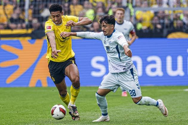 DORTMUND - Jobe Bellingham of Borussia Dortmund battles for possession with Laurin Ulrich of SC Paderborn 07 during the Bundesliga match between Borussia Dortmund and SC Paderborn 07 at Signal Iduna Park on September 12, 2026, in Dortmund, Germany. MARCEL TER BALS ANP Bundesliga 2026 27 xVIxANPxSportx xMarcelxterxBalsxIVx 568292500 originalFilename: 568292500.jpg