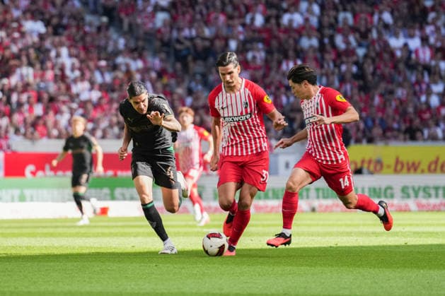 1. Bundesliga: SC Freiburg vs Borussia Mönchengladbach, 12.09.2026 Zweikampf zwischen Kevin Diks (Borussia Mönchengladbach, 4) und Igor MatanoviÄ‡ (SC Freiburg, 31) 1. Bundesliga: SC Freiburg vs Borussia Mönchengladbach, Europa-Park-Stadion, 12.09.2026 DFB DFL REGULATIONS PROHIBIT ANY USE OF PHOTOGRAPHS AS IMAGE SEQUENCES AND OR QUASI-VIDEO. *** Bundesliga Match: SC Freiburg vs. Borussia Mönchengladbach, September 12, 2026; Tackle between Kevin Diks (Borussia Mönchengladbach, No. 4) and Igor Matanovic SC Freiburg, 31 1 Bundesliga SC Freiburg vs. Borussia Mönchengladbach, Europa-Park Stadium, September 12, 2026 DFB and DFL regulations prohibit any use of photographs as image sequences and or quasi-video. Copyright: xBEAUTIFULxSPORTS Boscox
