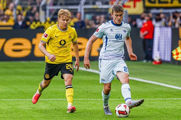 DORTMUND - Jano ter Horst of SC Paderborn 07 battles for possession with Daniel Svensson of Borussia Dortmund during the Bundesliga match between Borussia Dortmund and SC Paderborn 07 at Signal Iduna Park on September 12, 2026, in Dortmund, Germany. MARCEL TER BALS ANP Bundesliga 2026 27 xVIxANPxSportx xMarcelxterxBalsxIVx 568293707 originalFilename: 568293707.jpg