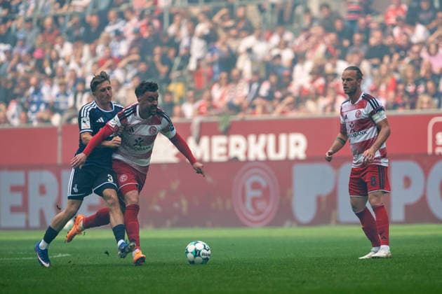 Frederik Christensen (MSV Duisburg, No. 3) in a tackle with Philipp Foerster (Fortuna Düsseldorf, No. 10) and Jorrit Hendrix (Fortuna Düsseldorf, 08 Fortuna Düsseldorf vs. MSV Duisburg, Soccer, 3rd Division, Matchday 05, 2026–27 Season, September 12, 2026, DFL regulations prohibit any use of photographs as image sequences and or quasi-video. Fortuna Düsseldorf vs. MSV Duisburg, soccer, 3rd League, Matchday 5, 2026–27 season, September 12, 2026, Düsseldorf Copyright: xEibner-Pressefoto LukasxBaldygax EP_LBA