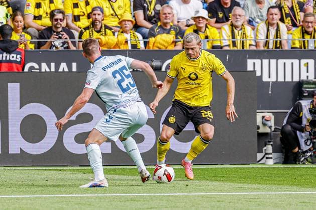DORTMUND - Julian Ryerson of Borussia Dortmund battles for possession with Tjark Scheller of SC Paderborn 07 during the Bundesliga match between Borussia Dortmund and SC Paderborn 07 at Signal Iduna Park on September 12, 2026, in Dortmund, Germany. MARCEL TER BALS ANP Bundesliga 2026 27 xVIxANPxSportx xMarcelxterxBalsxIVx 568294816 originalFilename: 568294816.jpg