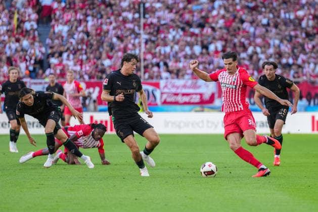 1. Bundesliga: SC Freiburg vs Borussia Mönchengladbach, 12.09.2026 Zweikampf zwischen Philipp Sander (Borussia Mönchengladbach, 16) und Igor MatanoviÄ‡ (SC Freiburg, 31) 1. Bundesliga: SC Freiburg vs Borussia Mönchengladbach, Europa-Park-Stadion, 12.09.2026 DFB DFL REGULATIONS PROHIBIT ANY USE OF PHOTOGRAPHS AS IMAGE SEQUENCES AND OR QUASI-VIDEO. *** Bundesliga Match: SC Freiburg vs. Borussia Mönchengladbach, September 12, 2026. A tackle between Philipp Sander (Borussia Mönchengladbach, 16) and Igor Matanovic SC Freiburg, 31 1 Bundesliga SC Freiburg vs. Borussia Mönchengladbach, Europa-Park Stadium, September 12, 2026 DFB and DFL regulations prohibit any use of photographs as image sequences and or quasi-video. Copyright: xBEAUTIFULxSPORTS Boscox