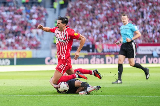 1. Bundesliga: SC Freiburg vs Borussia Mönchengladbach, 12.09.2026 Zweikampf zwischen Kevin Diks (Borussia Mönchengladbach, 4) und Igor MatanoviÄ‡ (SC Freiburg, 31) 1. Bundesliga: SC Freiburg vs Borussia Mönchengladbach, Europa-Park-Stadion, 12.09.2026 DFB DFL REGULATIONS PROHIBIT ANY USE OF PHOTOGRAPHS AS IMAGE SEQUENCES AND OR QUASI-VIDEO. *** Bundesliga Match: SC Freiburg vs. Borussia Mönchengladbach, September 12, 2026; Tackle between Kevin Diks (Borussia Mönchengladbach, No. 4) and Igor Matanovic SC Freiburg, 31 1 Bundesliga SC Freiburg vs. Borussia Mönchengladbach, Europa-Park Stadium, September 12, 2026 DFB and DFL regulations prohibit any use of photographs as image sequences and or quasi-video. Copyright: xBEAUTIFULxSPORTS Boscox