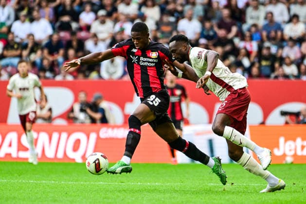 12.09.2026, GER, Fußball, Herren, 1. Bundesliga, FC Augsburg vs Bayer 04 Leverkusen Christian Kofane (Leverkusen, 35) setzt sich gegen Chrislain Matsima (FC Augsburg, 5) durch Augsburg WWK-Arena Bayern Deutschland *** September 12, 2026, GER, Soccer, Men s, 1. Bundesliga, FC Augsburg vs. Bayer 04 Leverkusen: Christian Kofane (Leverkusen, 35) scores against Chrislain Matsima (FC Augsburg, 5) at the Augsburg WWK Arena in Bavaria, Germany Copyright: xNordphotox xHafnerx