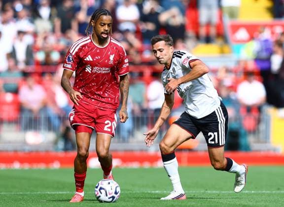 Bradley Barcola of Liverpool and Timothy Castagne of Fulham Liverpool v Fulham, Premier League, Football, Football, Anfield, Liverpool, UK - 12 Sep 2026Liverpool Anfield United Kingdom EDITORIAL USE ONLY No use with unauthorised audio, video, data, fixture lists, club league logos or live services. Online in-match use limited to 120 images, no video emulation. No use in betting, games or single club league player publications.  Copyright: xMattxWest Shutterstockx 17144551ai