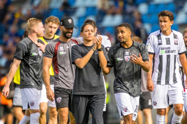 Saarbrücken, Germany, September 12, 2026, 3rd League 2026–2027, Matchday 5: 1 FC Saarbrücken vs. FC Ingolstadt 04. Pictured in the center: Coach Sabrina Wittmann of FCI celebrating with the traveling fans after the final whistle. DFB and DFL regulations prohibit any use of photographs as image sequences and or quasi-video Ludwigparkstadion, Saarland Copyright: xFotostandx xSchäferx