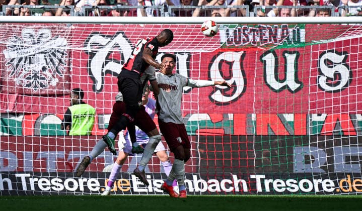 12.09.2026, xemx, Fussball 1.Bundesliga, FC Augsburg - Bayer 04 Leverkusen v.l. Christian Kofane (Bayer 04 Leverkusen), Fabian Rieder (FC Augsburg) Zweikampf, Aktion, action, battle for the ball (DFL DFB REGULATIONS PROHIBIT ANY USE OF PHOTOGRAPHS as IMAGE SEQUENCES and or QUASI-VIDEO) Augsburg *** September 12, 2026, xemx, Soccer, Bundesliga 1, FC Augsburg vs. Bayer 04 Leverkusen, Christian Kofane (Bayer 04 Leverkusen), Fabian Rieder, FC Augsburg, tackle, action, battle for the ball. DFL and DFB regulations prohibit any use of photographs as image sequences and or quasi-video. Augsburg