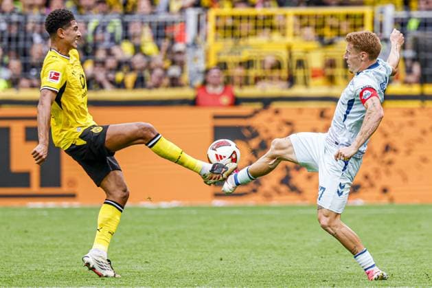 DORTMUND - Jobe Bellingham of Borussia Dortmund battles for possession with Laurin Curda of SC Paderborn 07 during the Bundesliga match between Borussia Dortmund and SC Paderborn 07 at Signal Iduna Park on September 12, 2026, in Dortmund, Germany. MARCEL TER BALS ANP Bundesliga 2026 27 xVIxANPxSportx xMarcelxterxBalsxIVx 568298640 originalFilename: 568298640.jpg