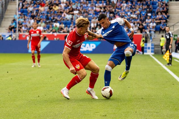 12.09.2026, xdaymx, Fussball 1.Bundesliga, TSG 1899 Hoffenheim - VfB Stuttgart. vl. Finn Jeltsch (VfB Stuttgart) im Zweikampf mit Adam Daghim (TSG Hoffenheim) (DFL DFB REGULATIONS PROHIBIT ANY USE OF PHOTOGRAPHS as IMAGE SEQUENCES and or QUASI-VIDEO) Sinsheim *** September 12, 2026, xdaymx, Soccer, Bundesliga 1, TSG 1899 Hoffenheim vs. VfB Stuttgart; Finn Jeltsch (VfB Stuttgart) in a tackle with Adam Daghim (TSG Hoffenheim); DFL; DFB; REGULATIONS PROHIBIT ANY USE OF PHOTOGRAPHS AS IMAGE SEQUENCES AND OR QUASI-VIDEO; Sinsheim