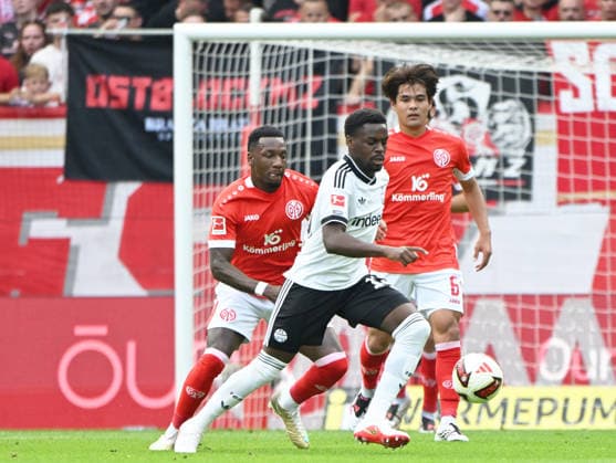 Fussball-Bundesliga - Saison 2026 2027 Mewa-Arena Mainz - 12.09.2026 1. FSV Mainz 05 (mz) - Eintracht Frankfurt (f) Ellyes SKHIRI (Eintracht Frankfurt)mi, li:Sheraldo BECKER (1. FSV Mainz 05), re: Kaishu SANO (1. FSV Mainz 05) DFL REGULATIONS PROHIBIT ANY USE OF PHOTOGRAPHS AS IMAGE SEQUENCES AND OR QUASI VIDEO EDITORIAL USE ONLY NATIONAL AND INTERNATIONAL NEWS AGENCIES OUT Fussball-Bundesliga - 1. FSV Mainz 05 *** Soccer Bundesliga Season 2026–2027, Mewa Arena, Mainz, September 12, 2026, 1 FSV Mainz 05 vs. Eintracht Frankfurt, Ellyes SKHIRI (Eintracht Frankfurt), Sheraldo BECKER (1 FSV Mainz 05), right Kaishu SANO 1 FSV Mainz 05 DFL REGULATIONS PROHIBIT ANY USE OF PHOTOGRAPHS AS IMAGE SEQUENCES AND OR QUASI-VIDEO; EDITORIAL USE ONLY; NATIONAL AND INTERNATIONAL NEWS AGENCIES EXCLUDED. German Bundesliga 1 FSV Mainz 05