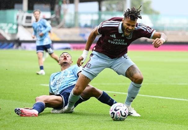 Tyrone Mings of Aston Villa is tackled by Dan Ndoye of Nottingham Forest Aston Villa v Nottingham Forest, Premier League, Football, Football, Villa Park, Birmingham, UK - 12 Sep 2026Birmingham Villa Park United Kingdom EDITORIAL USE ONLY No use with unauthorised audio, video, data, fixture lists, club league logos or live services. Online in-match use limited to 120 images, no video emulation. No use in betting, games or single club league player publications.  Copyright: xAnnaxGowthorpe Shutterstockx 17144543t