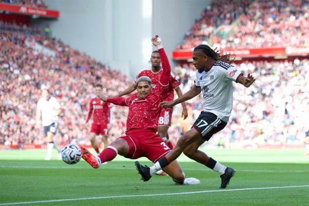 RECORD DATE NOT STATED Football - FA Premier League - Liverpool FC v Fulham FC LIVERPOOL, ENGLAND - Saturday, September 12, 2026: Liverpool s Ronald Araujo (L) is unable to stop Fulham s Alex Iwobi s cross during the FA Premier League match between Liverpool FC and Fulham FC at Anfield. (Photo by David Rawcliffe Propaganda) LIVERPOOL Anfield MERSEYSIDE ENGLAND  Copyright: xDavidxRawcliffex 2026-09-11-Liverpool_v_Fulham-041