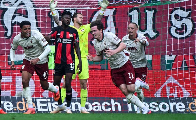 12.09.2026, xemx, Fussball 1.Bundesliga, FC Augsburg - Bayer 04 Leverkusen v.l. Michael Gregoritsch (FC Augsburg) Jubel, Torjubel, celebrate the goal, jubelt ueber das Tor zum 2:1 (DFL DFB REGULATIONS PROHIBIT ANY USE OF PHOTOGRAPHS as IMAGE SEQUENCES and or QUASI-VIDEO) Augsburg *** September 12, 2026, xemx, Soccer, Bundesliga 1, FC Augsburg vs. Bayer 04 Leverkusen – Michael Gregoritsch of FC Augsburg celebrates, Goal celebration, celebrating the goal, celebrating the 2–1 goal DFL DFB REGULATIONS PROHIBIT ANY USE OF PHOTOGRAPHS as IMAGE SEQUENCES and or QUASI-VIDEO Augsburg