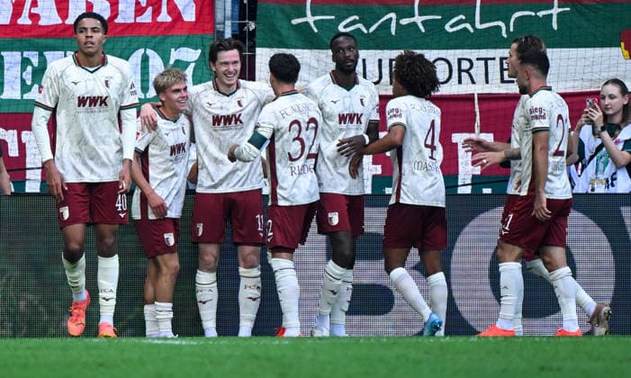 12.09.2026, xemx, Fussball 1.Bundesliga, FC Augsburg - Bayer 04 Leverkusen v.l. Michael Gregoritsch (FC Augsburg) Jubel, Torjubel, celebrate the goal, jubelt ueber das Tor zum 2:1 (DFL DFB REGULATIONS PROHIBIT ANY USE OF PHOTOGRAPHS as IMAGE SEQUENCES and or QUASI-VIDEO) Augsburg *** September 12, 2026, xemx, Soccer, Bundesliga 1, FC Augsburg vs. Bayer 04 Leverkusen – Michael Gregoritsch of FC Augsburg celebrates, Goal celebration, celebrating the goal, celebrating the 2–1 goal DFL DFB REGULATIONS PROHIBIT ANY USE OF PHOTOGRAPHS as IMAGE SEQUENCES and or QUASI-VIDEO Augsburg