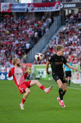 12.09.2026, xjyhynx, Fussball 1.Bundesliga, SC Freiburg - Borussia Mönchengladbach v.l., Niklas Beste (19, SC Freiburg) im Zweikampf mit David Herold (20, Borussia Mönchengladbach) (DFL DFB REGULATIONS PROHIBIT ANY USE OF PHOTOGRAPHS as IMAGE SEQUENCES and or QUASI-VIDEO) Freiburg *** September 12, 2026, xjyhynx, Soccer, Bundesliga 1, SC Freiburg vs. Borussia Mönchengladbach, Niklas Beste 19, SC Freiburg in a tackle with David Herold 20, Borussia Mönchengladbach DFL DFB REGULATIONS PROHIBIT ANY USE OF PHOTOGRAPHS as IMAGE SEQUENCES and or QUASI-VIDEO Freiburg
