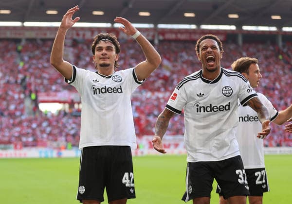 12.09.2026, Fussball Bundesliga, 1. FSV Mainz 05 - Eintracht Frankfurt, v.l., Torjubel zum 0:3 durch Can Uzun (Eintracht Frankfurt), Goal celebration, celebrate the goal, Jeremiaha Maluze (Eintracht Frankfurt) DFL DFB REGULATIONS PROHIBIT ANY USE OF PHOTOGRAPHS AS IMAGE SEQUENCES AND OR QUASI-VIDEO. xdcx *** September 12, 2026, Bundesliga Soccer, 1. FSV Mainz 05 vs. Eintracht Frankfurt, from left, goal celebration for the 0–3 goal by Can Uzun of Eintracht Frankfurt, goal celebration, celebrating the goal, Jeremiaha Maluze, Eintracht Frankfurt. DFL and DFB regulations prohibit any use of photographs as image sequences and or quasi-video. xdcx Copyright: HMBxMedia Claus