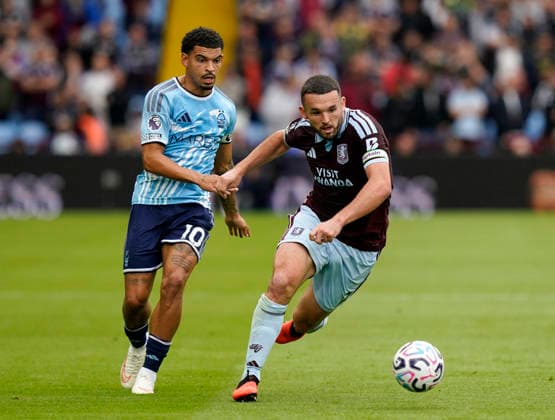 Birmingham, England, 12th September 2026. Morgan Gibbs White of Nottingham Forest tussles with John McGinn of Aston Villa during the Aston Villa vs Nottingham Forest Premier League match at Villa Park, Birmingham. Picture credit should read: Andrew Yates Sportimage EDITORIAL USE ONLY. No use with unauthorised audio, video, data, fixture lists, club league logos or live services. Online in-match use limited to 120 images, no video emulation. No use in betting, games or single club league player publications. SPI_009_AY_Villa_Forest SPI-4990-0008
