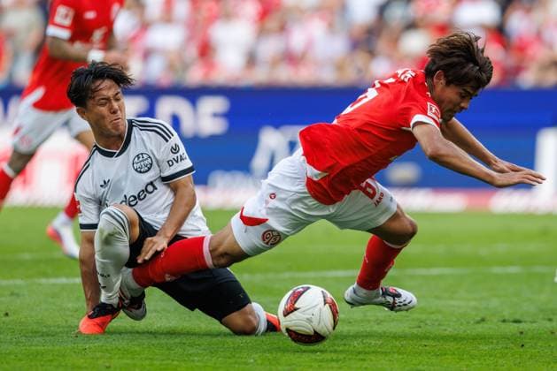 Kaishu Sano (FSV Mainz 05) im Zweikampf mit Keita Kosugi (Eintracht Frankfurt), Aktion Action FSV Mainz 05 vs Eintracht Frankfurt, Fussball, Bundesliga, 03. Spieltag, Saison 2026 2027, 12.09.2026 FSV Mainz 05 vs Eintracht Frankfurt, Fussball, Bundesliga, 03. Spieltag, Saison 2026 2027, 12.09.2026 *** Kaishu Sano (FSV Mainz 05) in a tackle with Keita Kosugi (Eintracht Frankfurt), Action: FSV Mainz 05 vs. Eintracht Frankfurt, Soccer, Bundesliga, Matchday 3, 2026–2027 Season, September 12, 2026 FSV Mainz 05 vs. Eintracht Frankfurt, Soccer, Bundesliga, Matchday 3, 2026–2027 season, September 12, 2026 Copyright: xEibnerxPressefotox EP_ANS