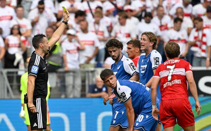 Schiedsrichter Referee Sven Jablonski zeigt Wouter Burger TSG 1899 Hoffenheim (18) gelbe Karte gelb Verwarnung TSG 1899 Hoffenheim vs VfB Stuttgart 12.09.2026 DFL REGULATIONS PROHIBIT ANY USE OF PHOTOGRAPHS AS IMAGE SEQUENCES AND OR QUASI-VIDEO TSG 1899 Hoffenheim vs VfB Stuttgart *** Referee Sven Jablonski shows Wouter Burger of TSG 1899 Hoffenheim a yellow card in the match between TSG 1899 Hoffenheim and VfB Stuttgart on September 12, 2026. DFL regulations prohibit any use of PHOTOGRAPHS AS IMAGE SEQUENCES AND OR QUASI-VIDEO TSG 1899 Hoffenheim vs. VfB Stuttgart
