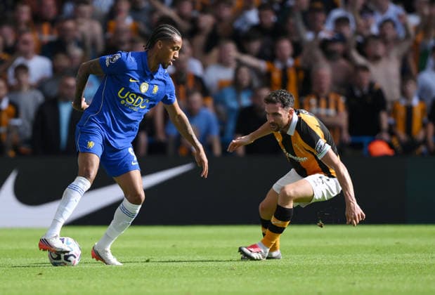 Chelsea v Hull City Premier League Chelsea s Joao Pedro (left) and Hull City s Lewie Coyle during the Premier League match at Stamford Bridge, London 12 09 2026 UK Newspapers OUT Copyright: xDanielxHamburyx FIL-23926-0117