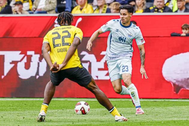 DORTMUND - Raphael Obermair of SC Paderborn 07 battles for possession with Joane Gadou of Borussia Dortmund during the Bundesliga match between Borussia Dortmund and SC Paderborn 07 at Signal Iduna Park on September 12, 2026, in Dortmund, Germany. MARCEL TER BALS ANP Bundesliga 2026 27 xVIxANPxSportx xMarcelxterxBalsxIVx 568305108 originalFilename: 568305108.jpg