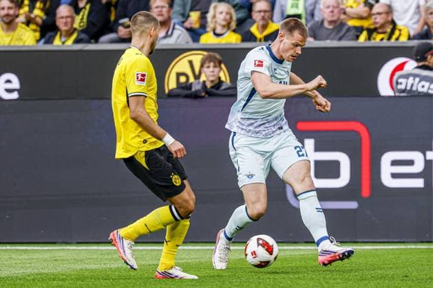 DORTMUND - Steffen Tigges of SC Paderborn 07 battles for possession with Waldemar Anton of Borussia Dortmund during the Bundesliga match between Borussia Dortmund and SC Paderborn 07 at Signal Iduna Park on September 12, 2026, in Dortmund, Germany. MARCEL TER BALS ANP Bundesliga 2026 27 xVIxANPxSportx xMarcelxterxBalsxIVx 568306029 originalFilename: 568306029.jpg